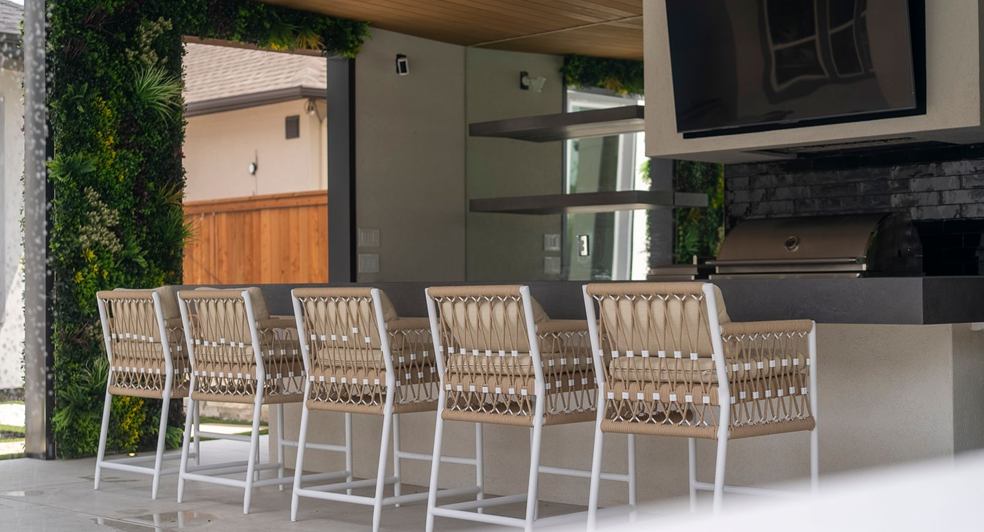 Entertainment area with an outdoor TV and lounge seating